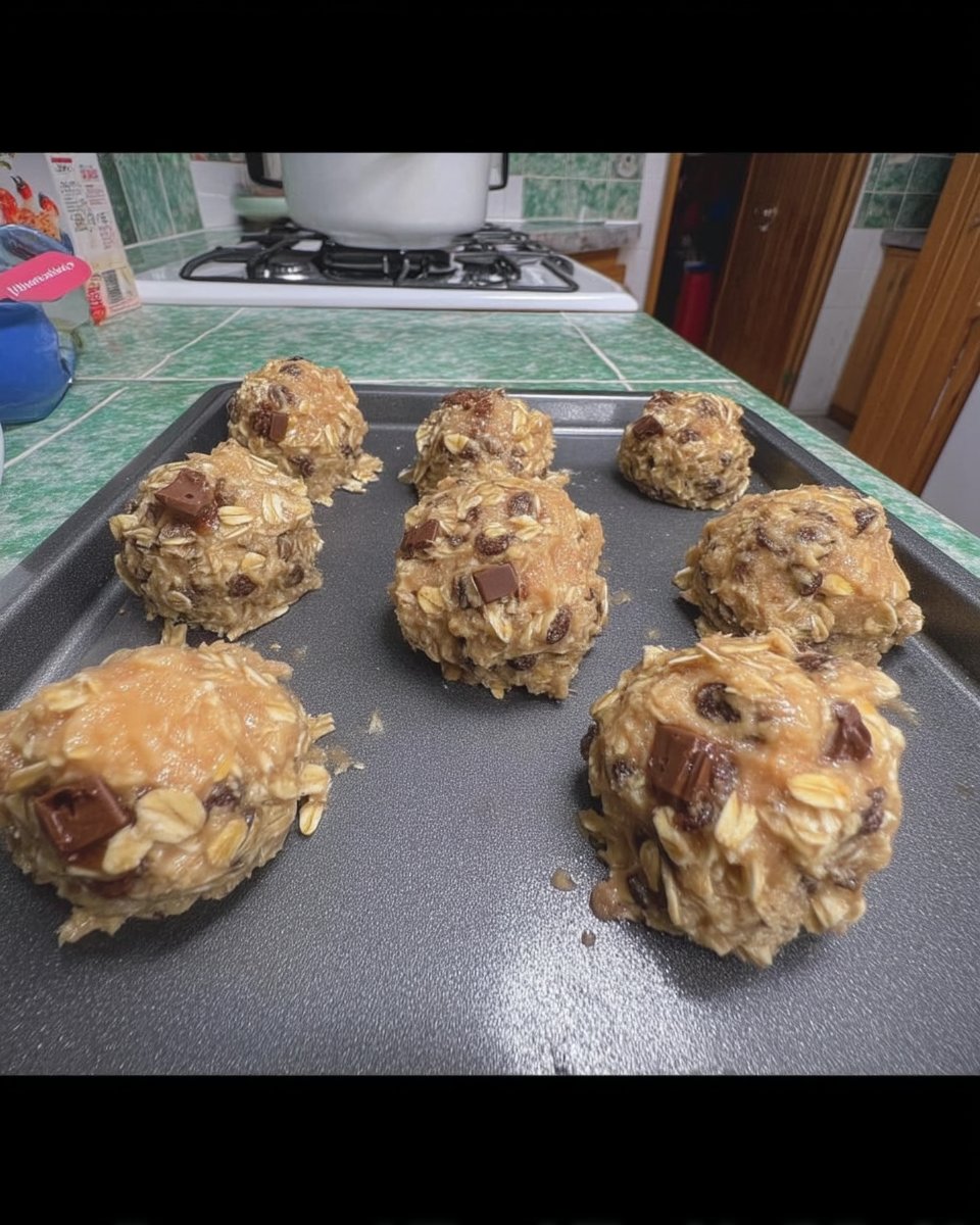 Ingredients for oatmeal raisin cookies including oats molasses and brown sugar
