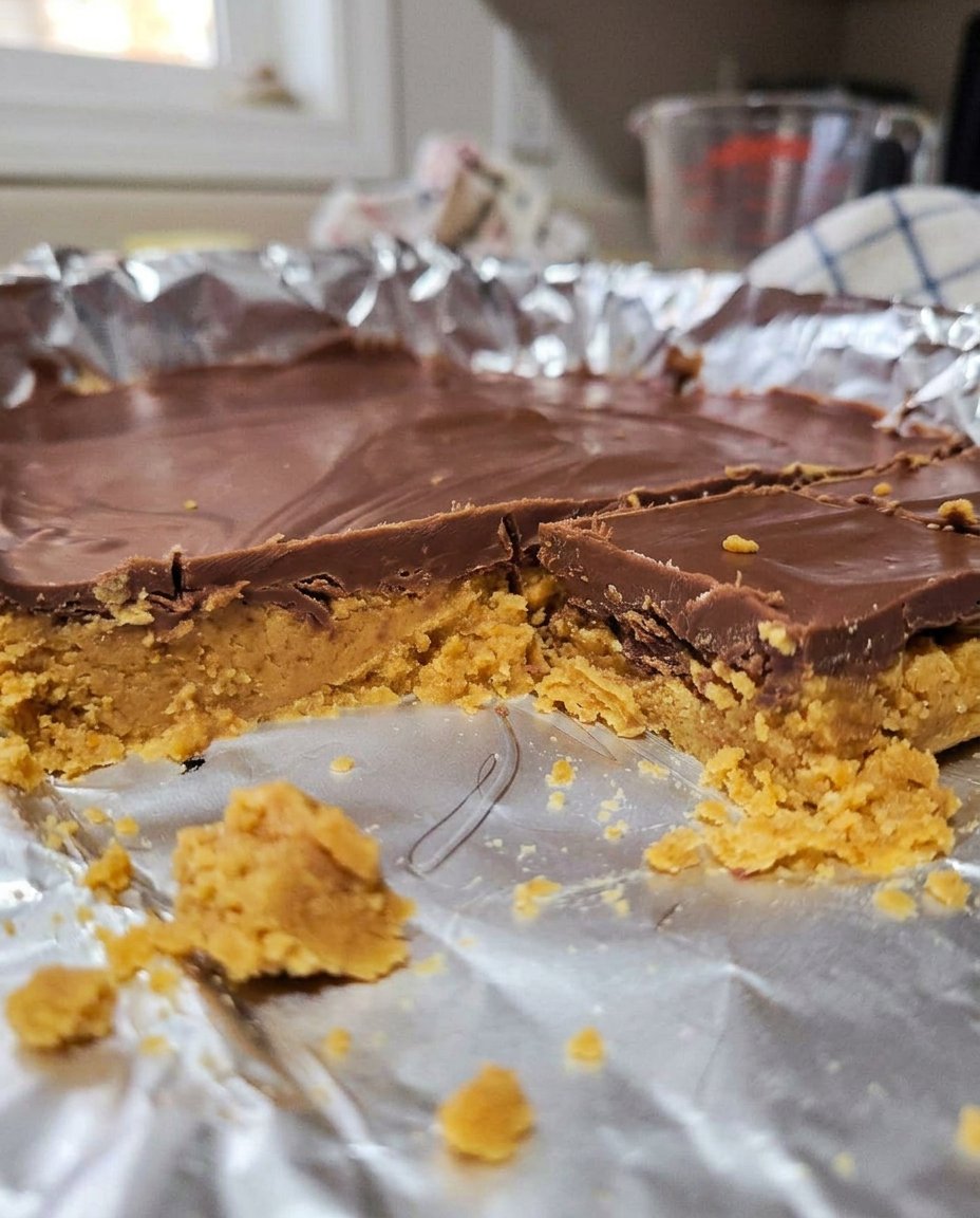 A platter of peanut butter no bake cookies being served at a party