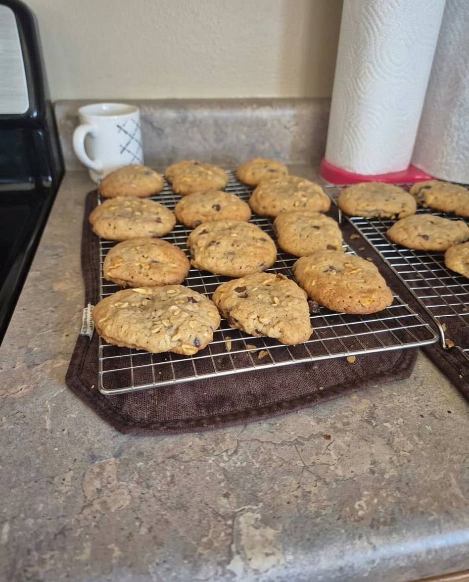 Potato Chip Chocolate Chip 14 Potato chip chocolate chip cookies served with a glass of milk on a rustic tray.