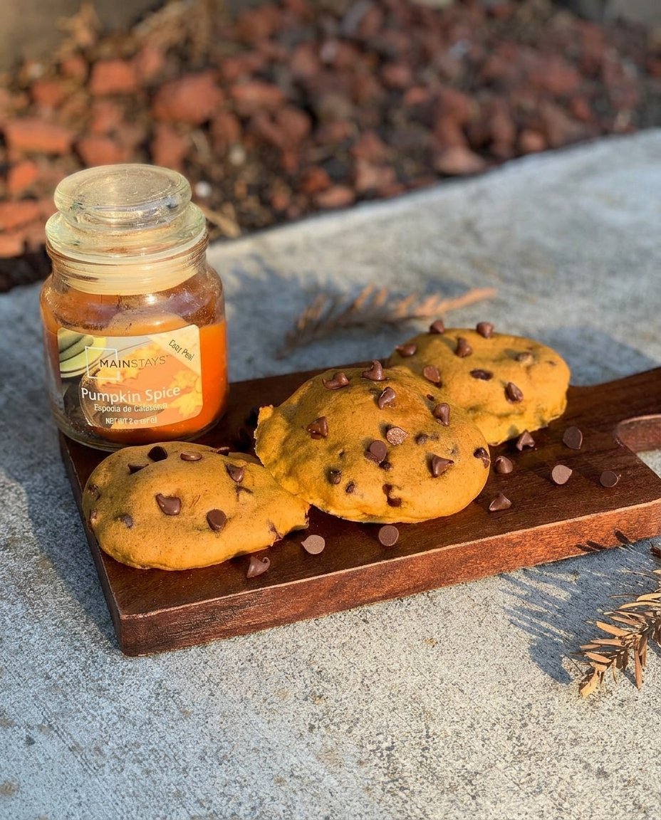 Pumpkin Chocolate Chip Cookies 14 A plate of warm pumpkin chocolate chip cookies served with a glass of milk