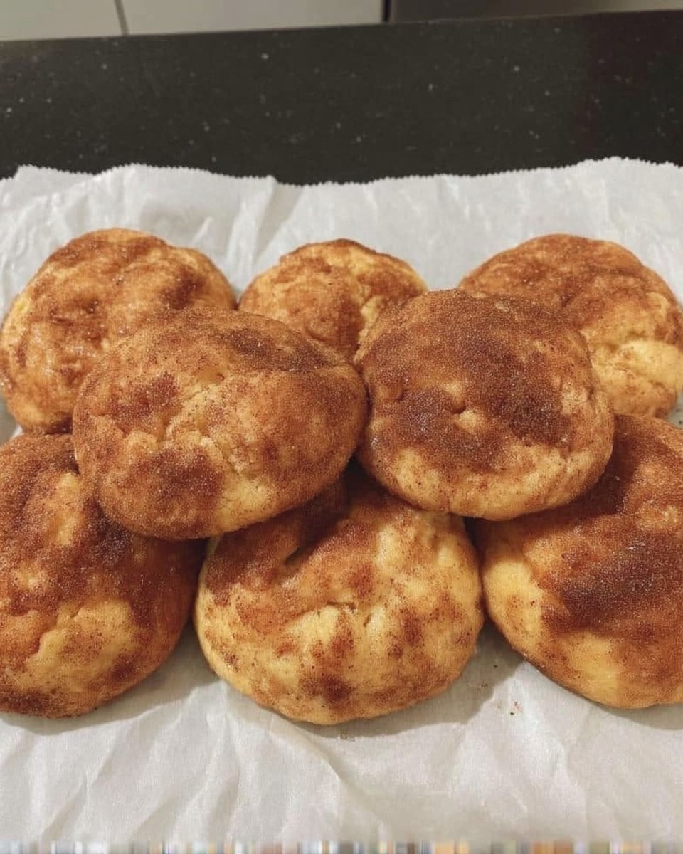 Gluten free snickerdoodles served on a rustic plate with tea